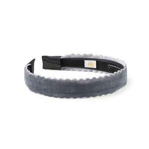 Gray velvet headband on a white background