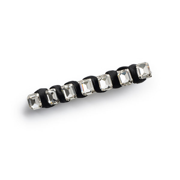 A black satin hair clip with all-over embellished crystals.