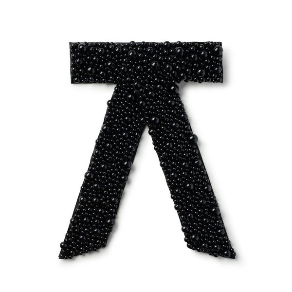 pearl hair clip in a bow shape in black color