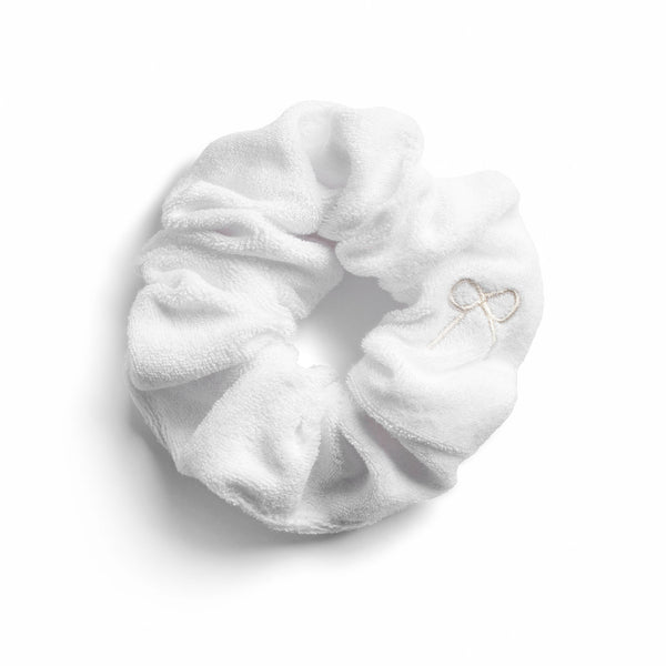 A white Halo Luxe Terry cloth scrunchie on a white background.