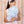 Load image into Gallery viewer, A teenage girl wearing eyelet side bow headband in cream by Halo Luxe