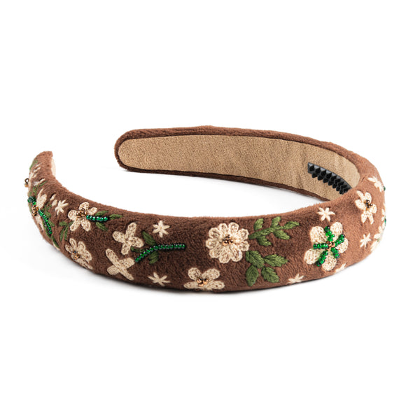 Brown headband for girls with floral embroidery on a white background