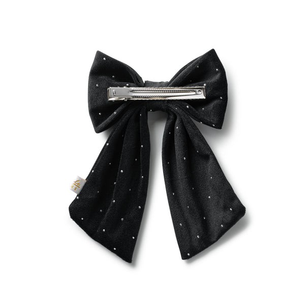 Black bow hair clip with silver barrette on a white background