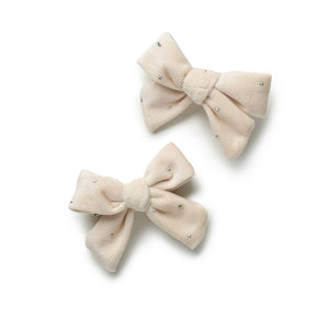 Two beige hair bow CLIPS with rhinestones on a white background