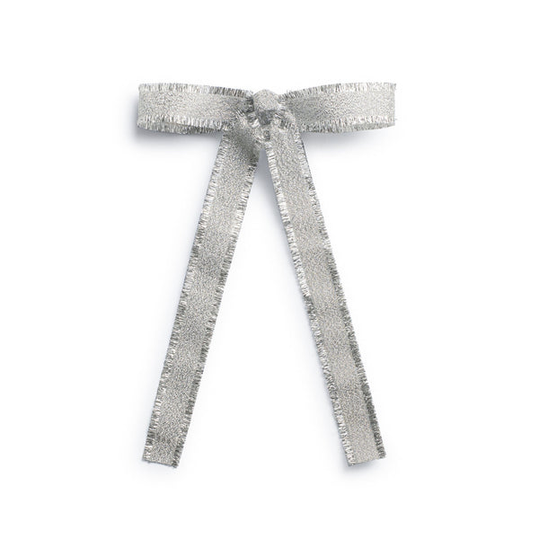 A silver deconstructed grosgrain ribbon clip  with a long tail clip, hand-crafted with raw edges and an alligator clip at the base.
